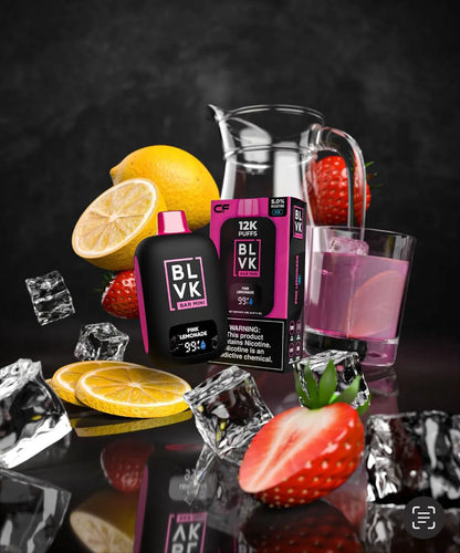 Pink Lemonade BLVK Bar Mini 12K Puffs: "BLVK Bar Mini 12K Puffs disposable vape in Pink Lemonade flavor featuring sliced lemons, strawberries, a glass of pink lemonade, and ice cubes against a dark backdrop."